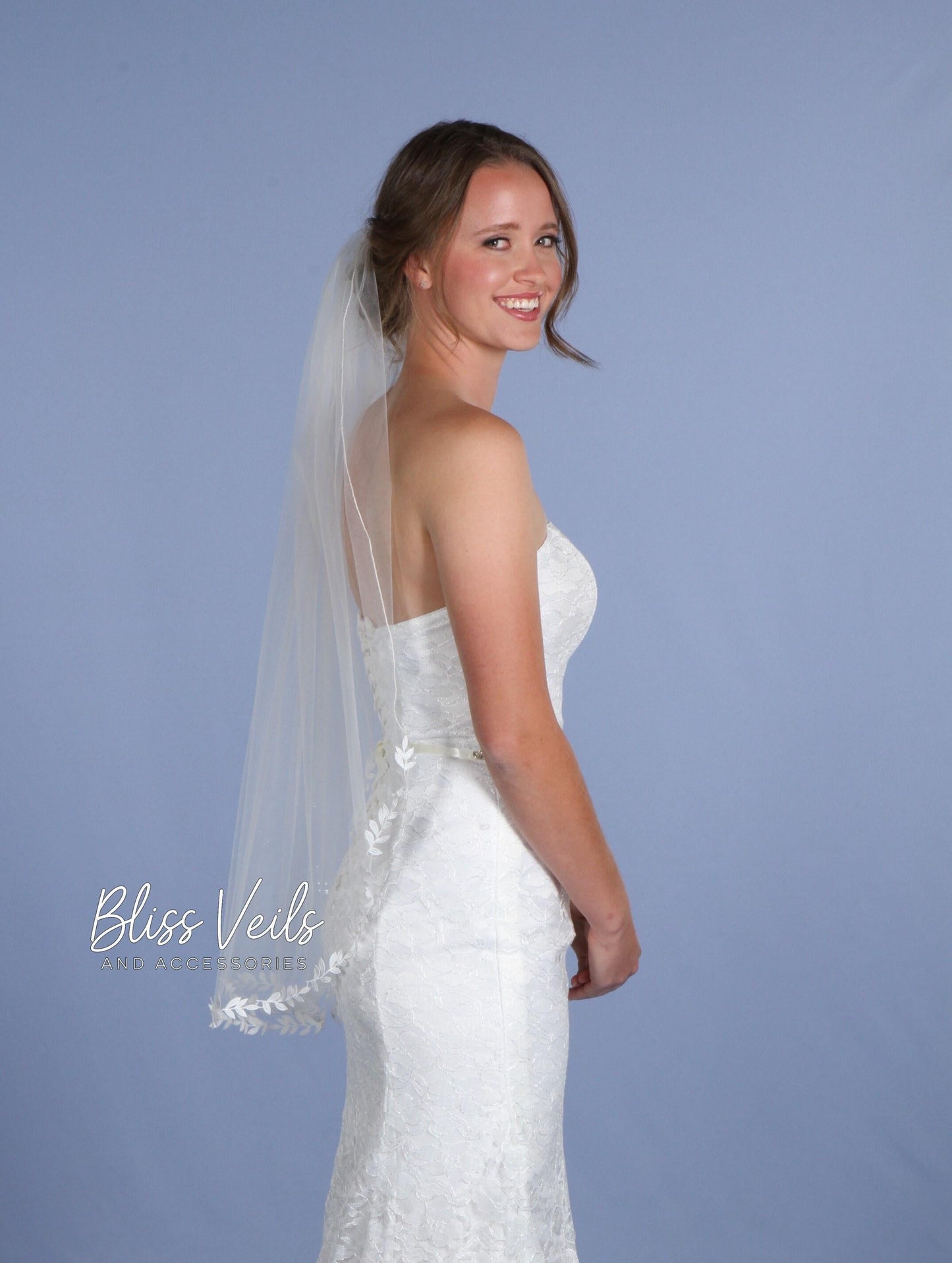 One tier lace wedding veil with leaf trim