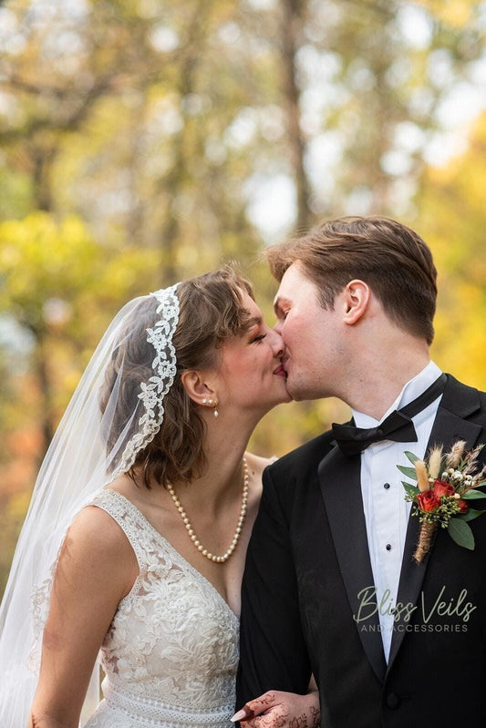 Fingertip lace mantilla wedding veil