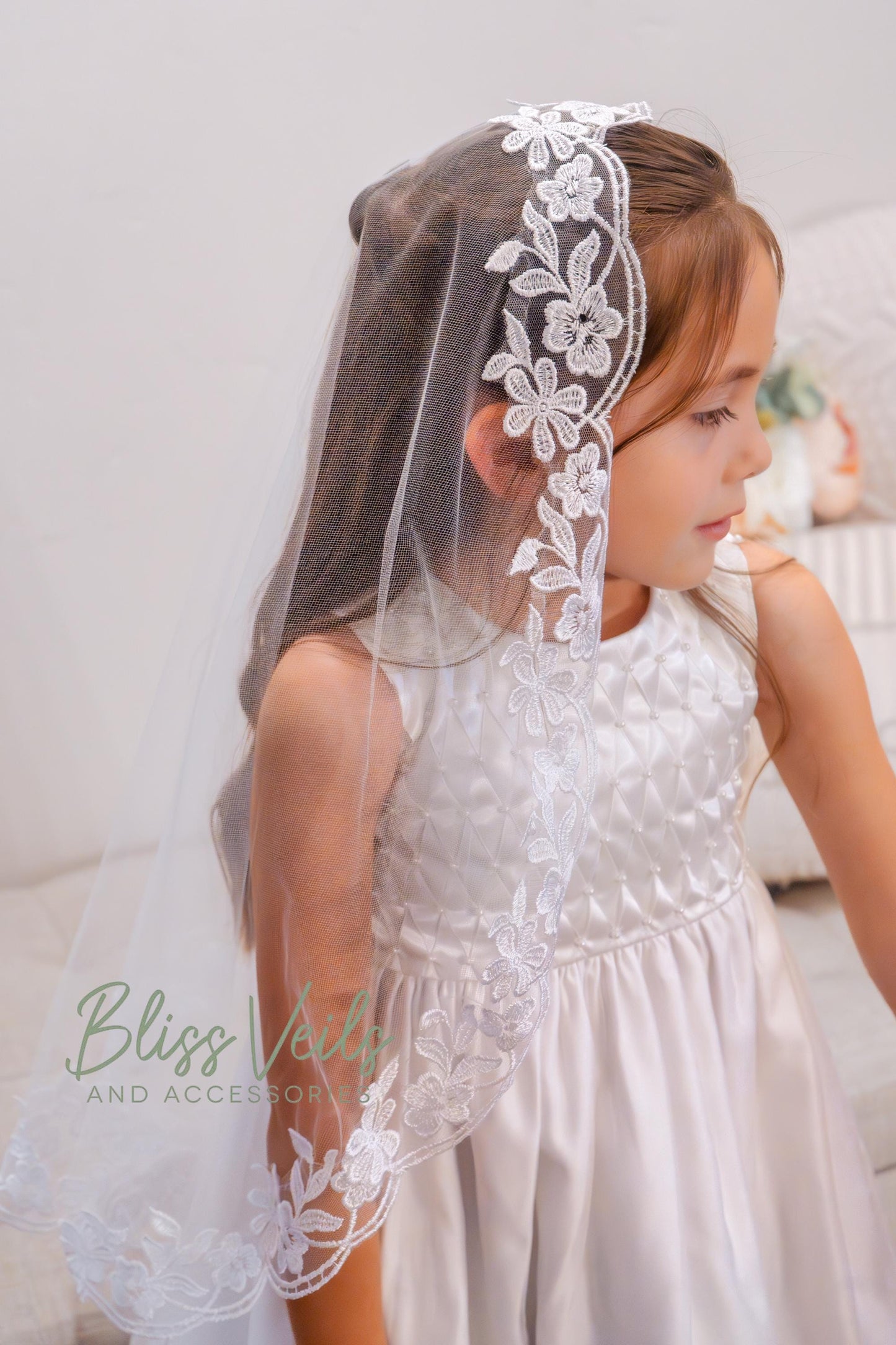 First Holy Communion lace mantilla veil in soft tulle with traditional white tones