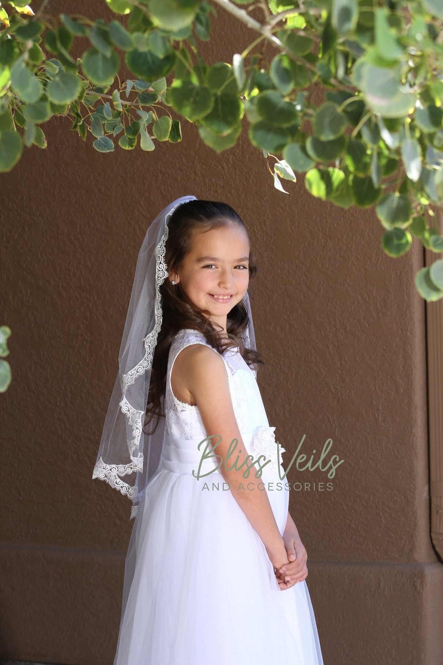 First Holy Communion veil with scalloped lace edge in soft white tulle