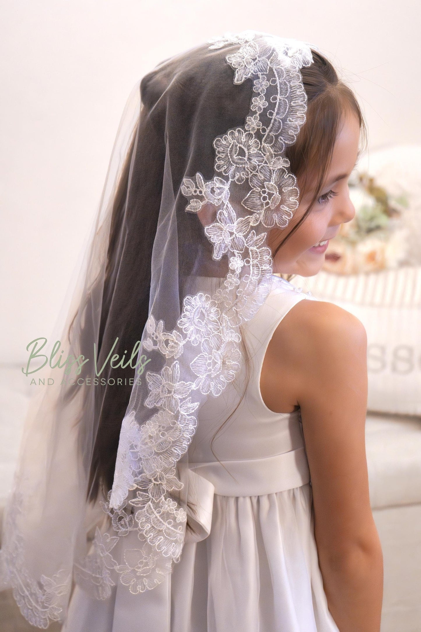 Lace mantilla First Holy Communion veil with soft tulle and delicate lace trim in bright white