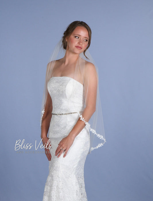 One tier lace wedding veil with leaf trim