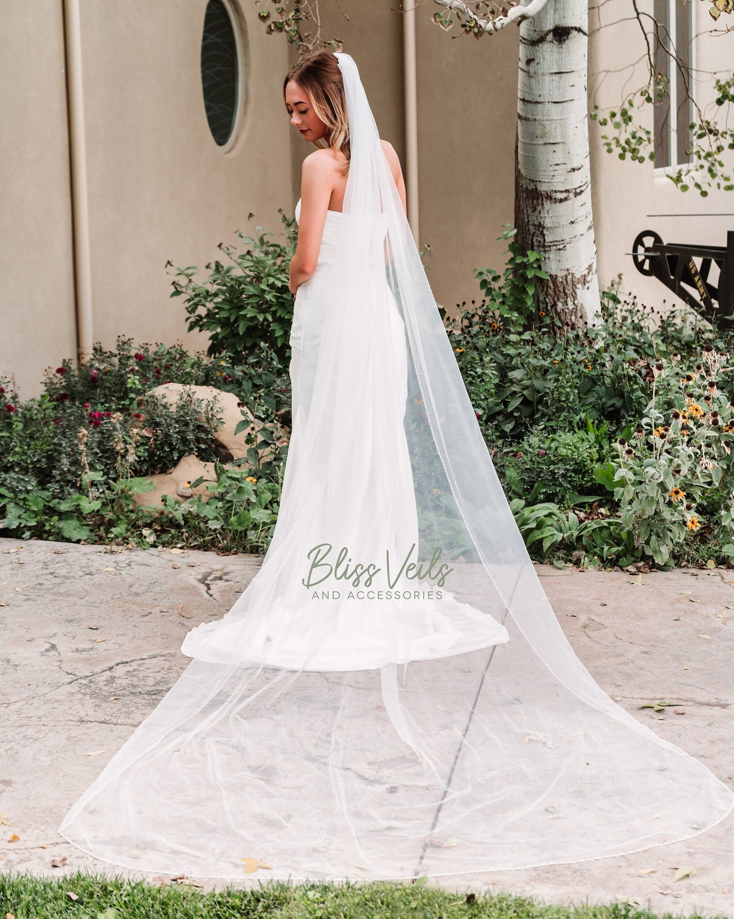 Pearl and crystal beaded wedding veil shown in cathedral length