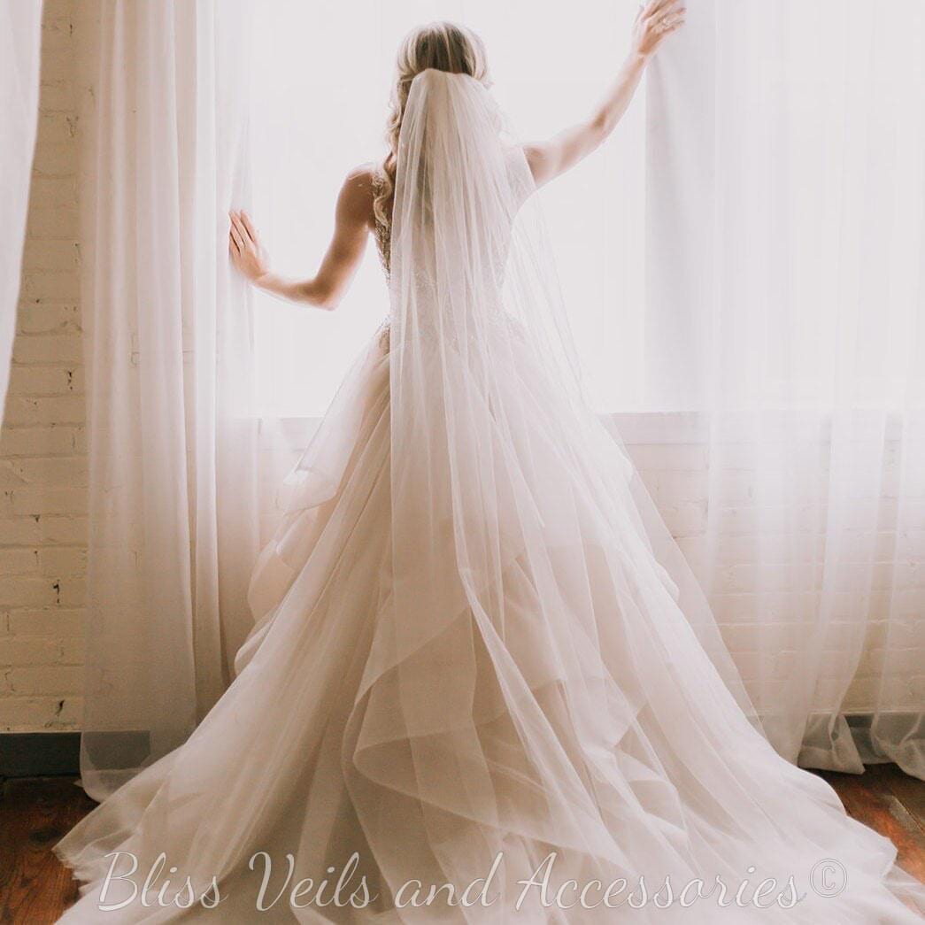 Pencil edge wedding veil with soft tulle and medium fullness