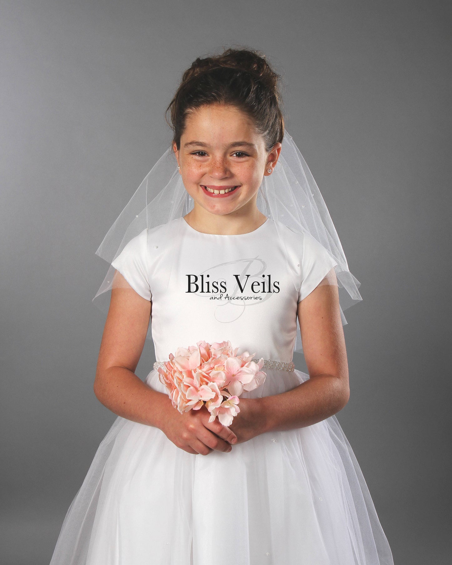 First Communion veil with pearls worn for Holy Communion