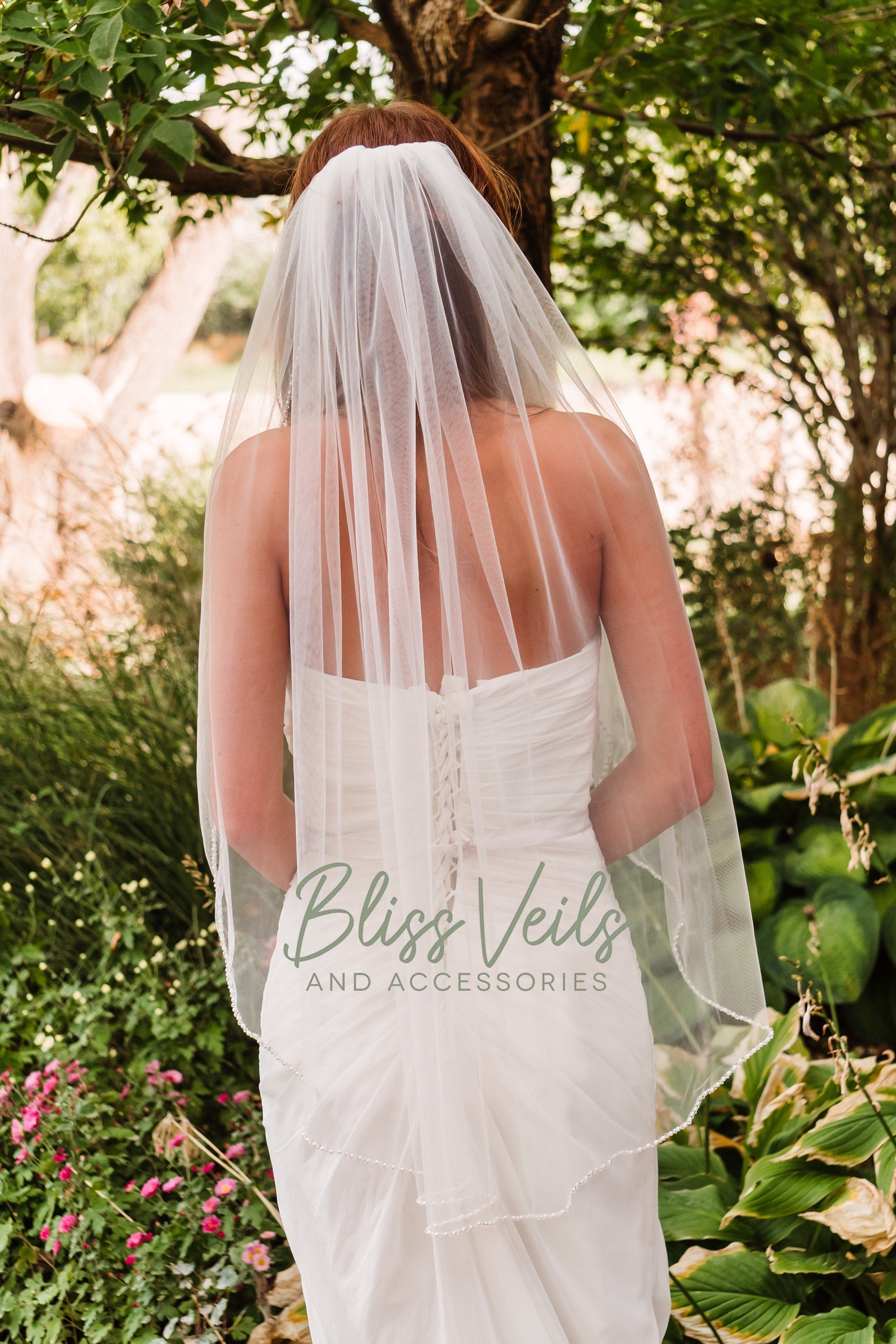 Wedding veil with pearl and crystal beaded detail